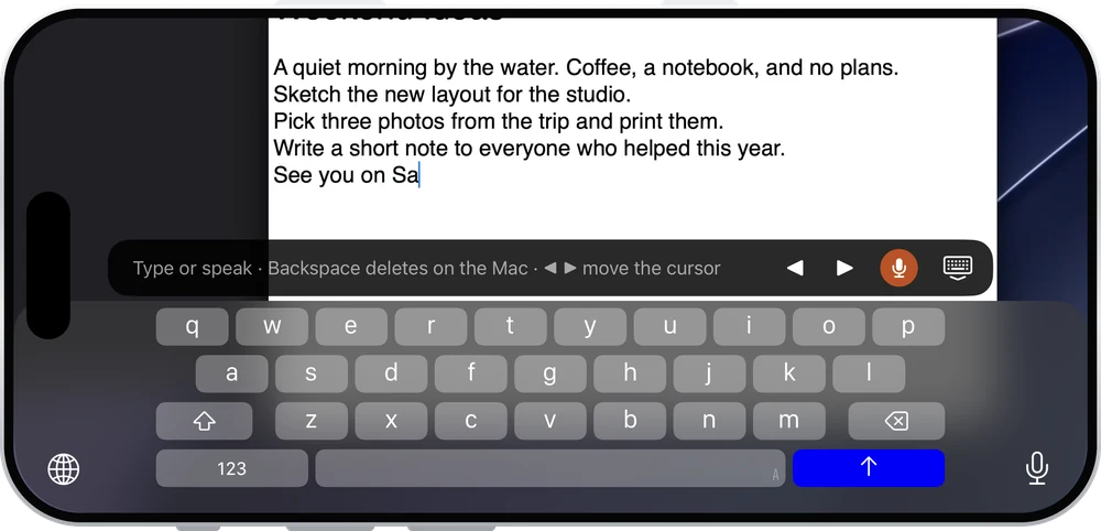 The iPhone keyboard typing into a document on the Mac