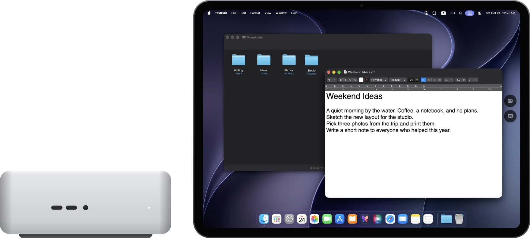 A Mac mini next to an iPad Pro showing the Mac desktop